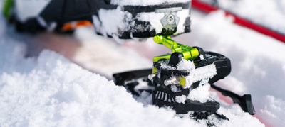 close up of boot stepping on tech bindings